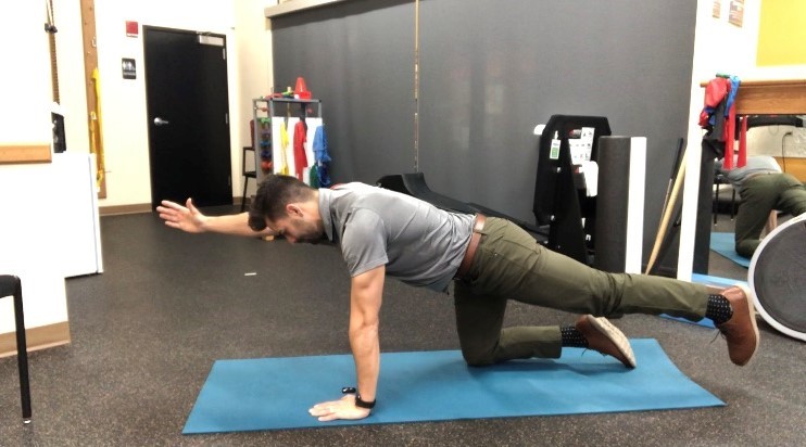 5 Exercises to Help Low Back Pain in Golfers - Athletico